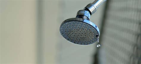 shower head leaks when running bath